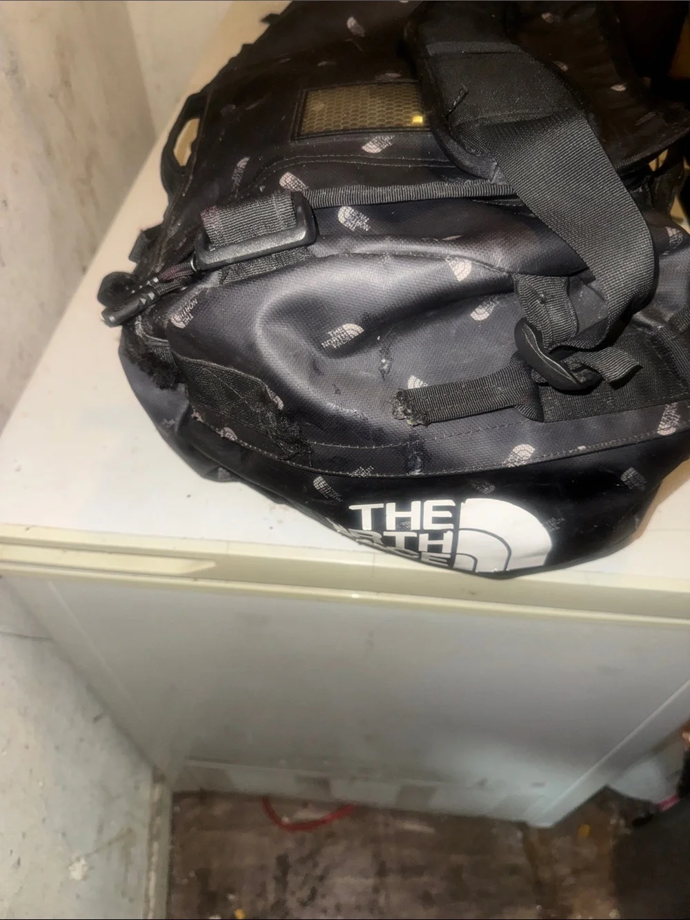 The North Face limited edition Black Duffel Messenger Bag with TNF logo repeat